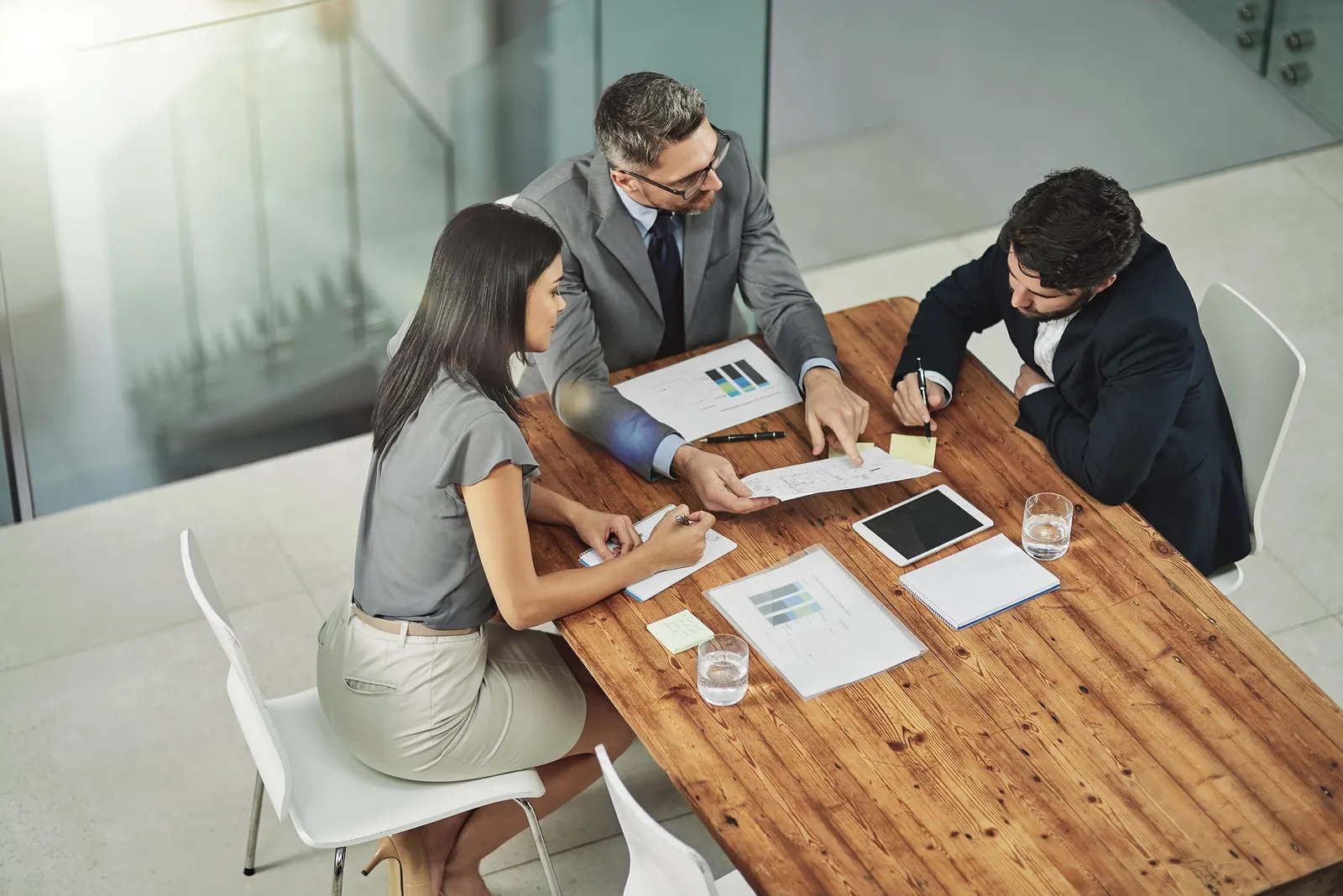 A consultant meeting with a client around a table